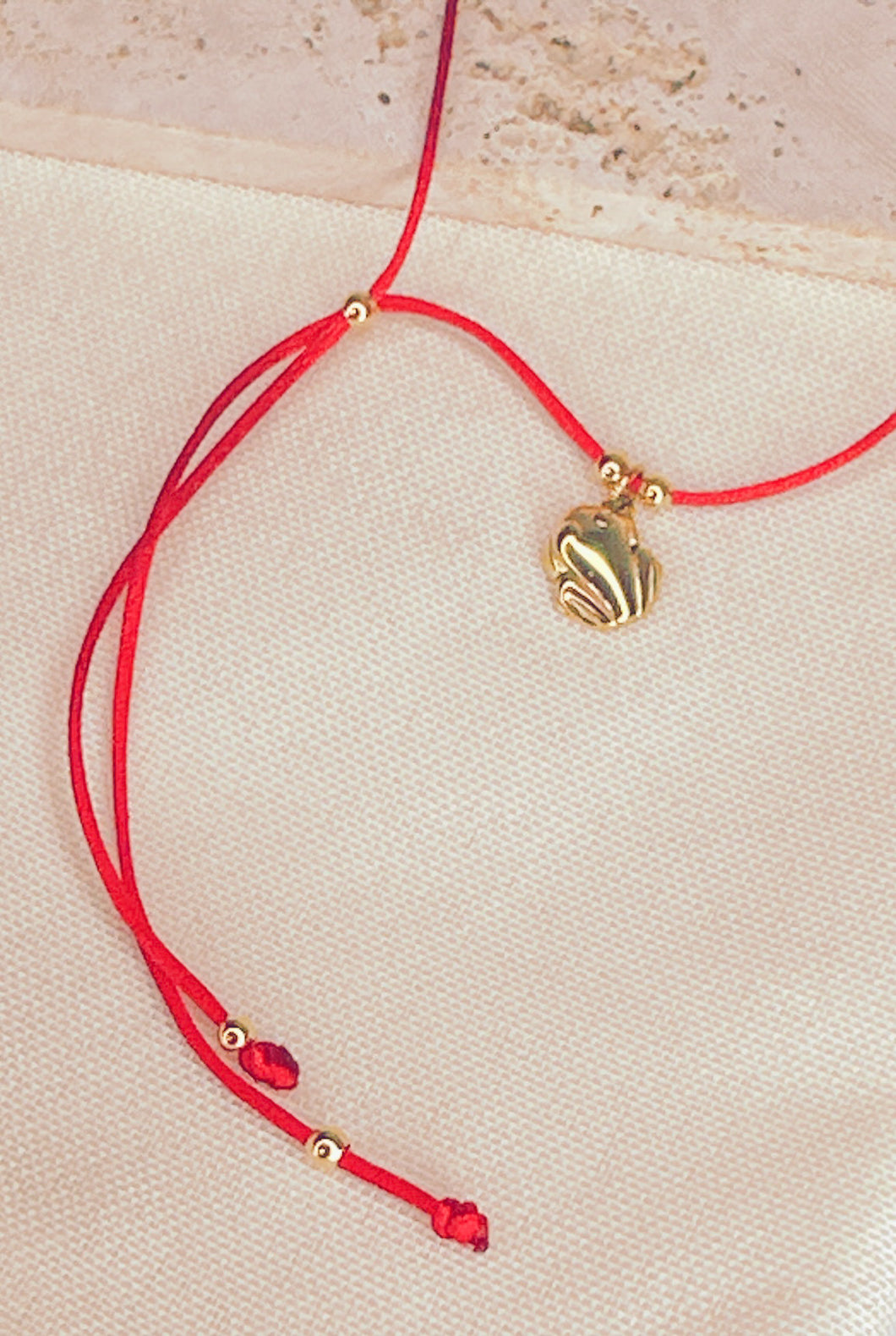 GOLD COQUI NECKLACE